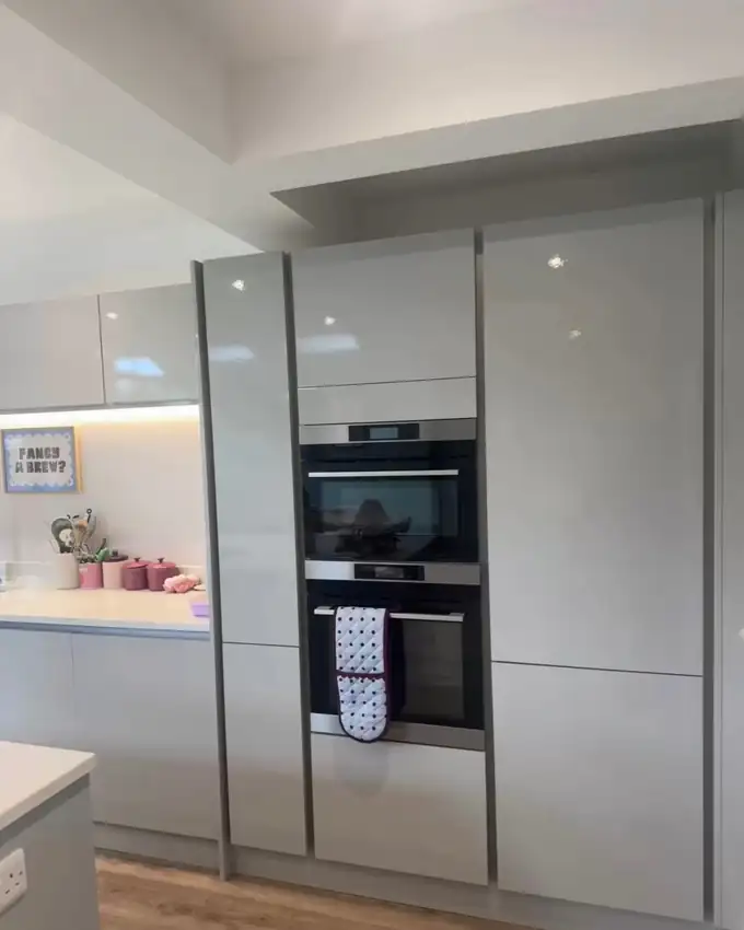 Gloss kitchen units and built-in ovens cleaned to a streak-free finish